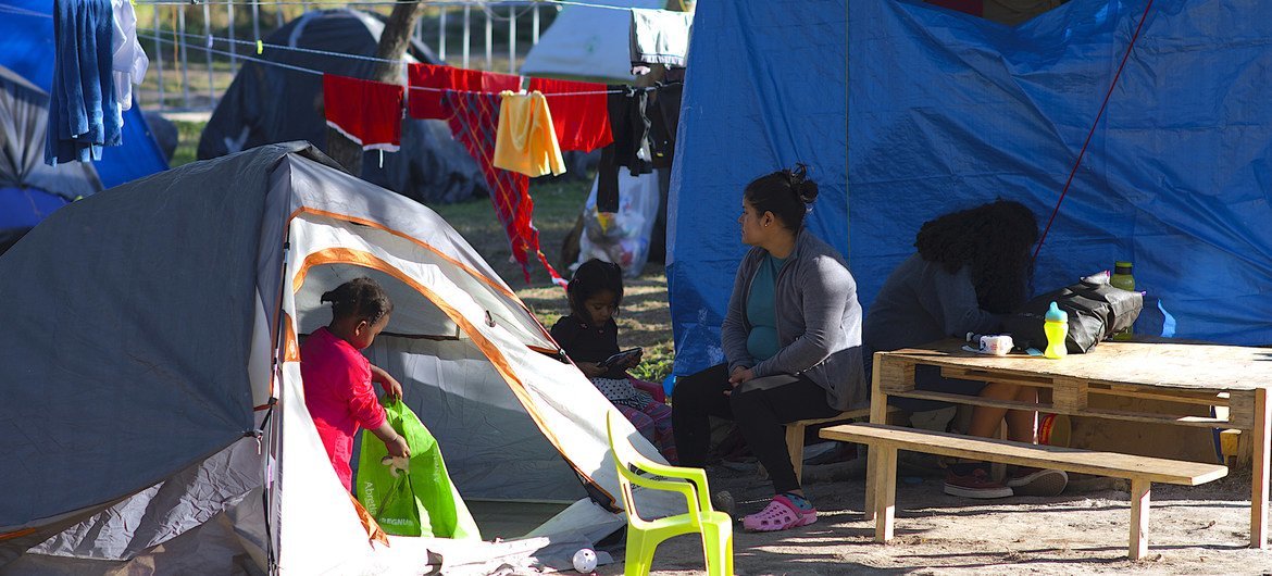 Asylum seekers, including children, at the Matamoros camp awaiting their US immigration hearings in Mexico. Asylum seekers, including children, at the Matamoros camp awaiting their US immigration hearings in Mexico.