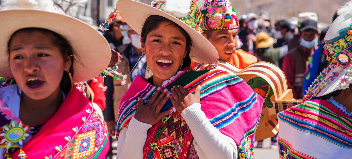 Young indigenous girls dancing a typical dance in rural Bolivia, October 2021. Young indigenous girls dancing a typical dance in rural Bolivia, October 2021.
