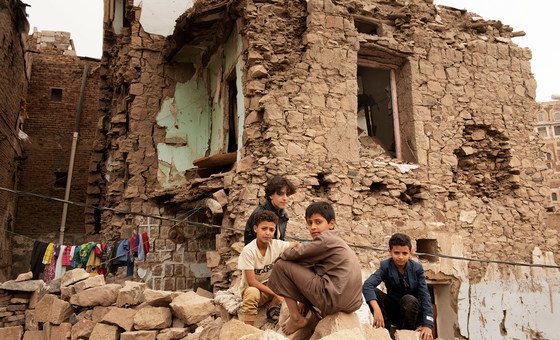 Children sit in front of a house damaged by an air strike, inside the old city of Sana'a, Yemen. (file) Children sit in front of a house damaged by an air strike, inside the old city of Sana'a, Yemen. (file)