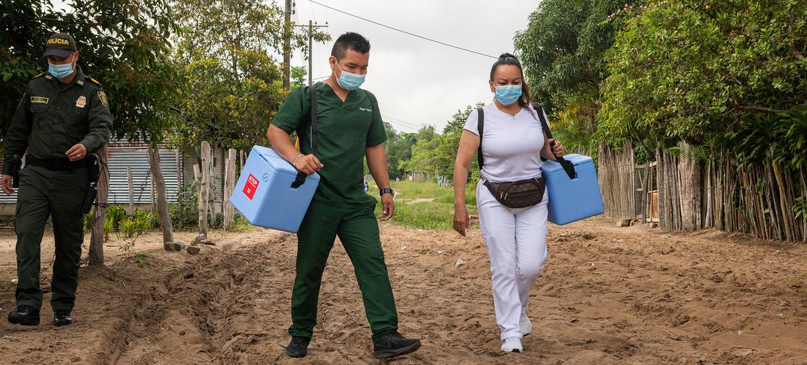 A vaccination team goes door-to-door in a working class neighbourhood of Puerto Inirida, Colombia, to offer COVID-19 vaccinations. A vaccination team goes door-to-door in a working class neighbourhood of Puerto Inirida, Colombia, to offer COVID-19 vaccinations.