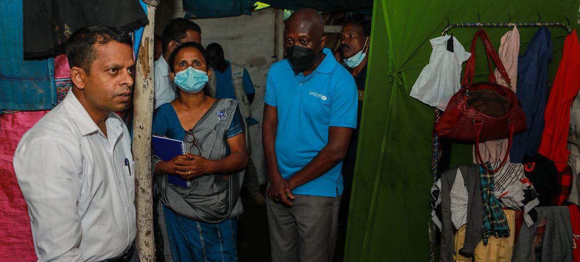 George Laryea-Adjei, South Asia Regional Manager (right) visits a family home in Watawala, Sri Lanka.