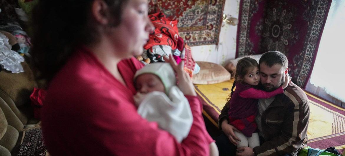 On 23 February 2022, a four-year-old girl and two-month-old baby are comforted by their parents after shelling by separatist forces in Novognativka, eastern Ukraine. On 23 February 2022, a four-year-old girl and two-month-old baby are comforted by their parents after shelling by separatist forces in Novognativka, eastern Ukraine.