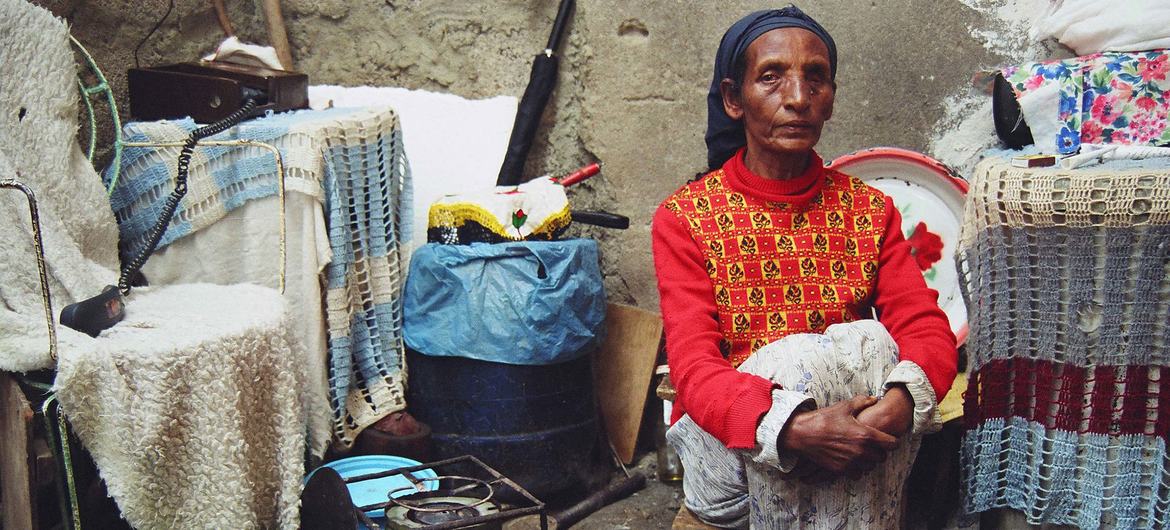 A trader affected by leprosy waits for customers in Addis Ababa, Ethiopia. A trader affected by leprosy waits for customers in Addis Ababa, Ethiopia.