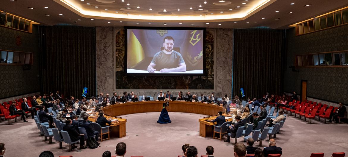 Volodymyr Zelenskyy (on screen), President of Ukraine, addresses the Security Council meeting on maintaining peace and security in Ukraine.