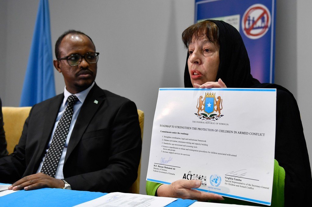 Virginia Gamba, the Special Representative of the Secretary-General for Children and Armed Conflict, displays the signed roadmap to strengthen the protection of children in armed conflict during a meeting with Somali Federal Government Ministries and commissioner of police in Mogadishu, Somalia on 28 October 2019. Virginia Gamba, the Special Representative of the Secretary-General for Children and Armed Conflict, displays the signed roadmap to strengthen the protection of children in armed conflict during a meeting with Somali Federal Government Ministries and commissioner of police in Mogadishu, Somalia on 28 October 2019.