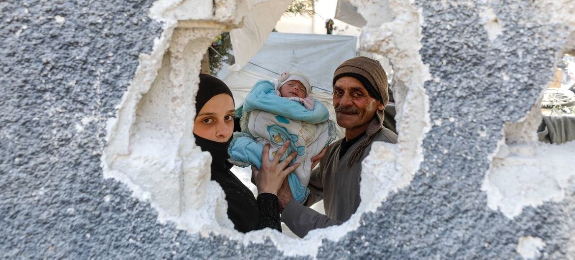 A one-month-old baby shelters with her family in Adra after fleeing eastern Ghouta in Syria. A one-month-old baby shelters with her family in Adra after fleeing eastern Ghouta in Syria.