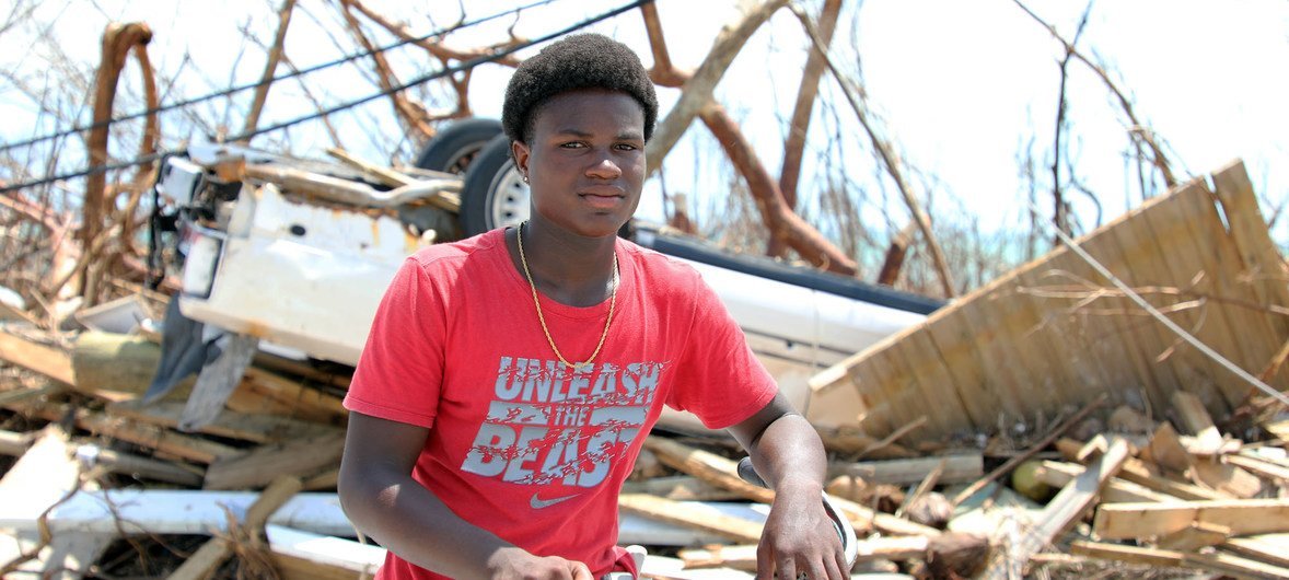 Fifteen-year-old Benson Etienne and his family escaped before their house collapsed in the hurricane-hit Marsh Harbour, in Abaco Island, Bahamas. Fifteen-year-old Benson Etienne and his family escaped before their house collapsed in the hurricane-hit Marsh Harbour, in Abaco Island, Bahamas.