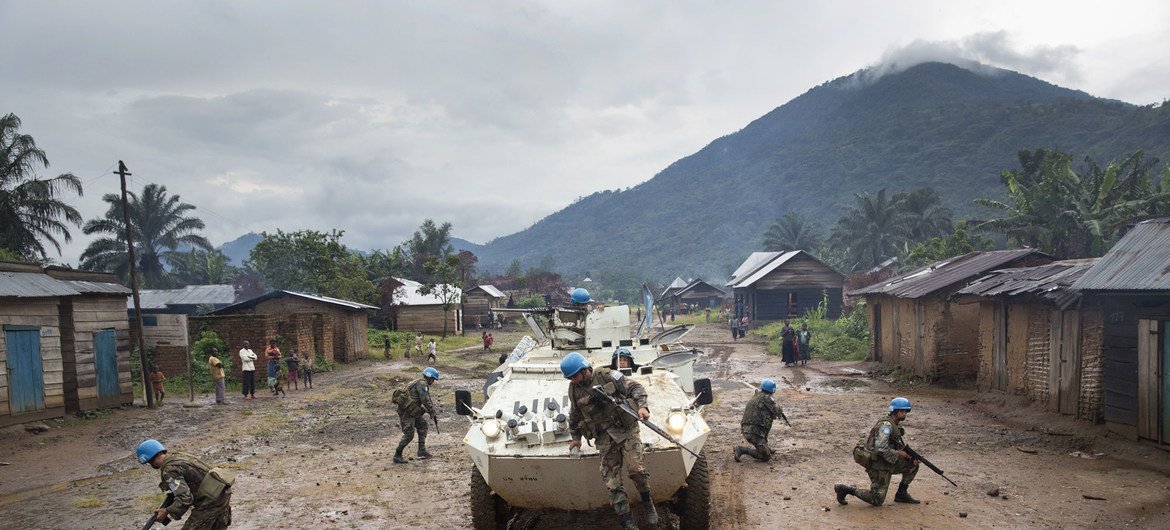 Peacekeepers serving in the DR Congo secure the town of Pinga after the withdrawal of a militia group. (file) Peacekeepers serving in the DR Congo secure the town of Pinga after the withdrawal of a militia group. (file)