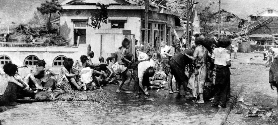 Injured civilians, having escaped the raging inferno, gathered on a pavement west of Miyuki-bashi in Hiroshima, Japan, about 11 a.m. on 6 August 1945. Injured civilians, having escaped the raging inferno, gathered on a pavement west of Miyuki-bashi in Hiroshima, Japan, about 11 a.m. on 6 August 1945.