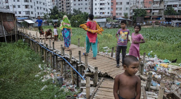 Residents live in a slum in Dhaka, the capital of Bangladesh.